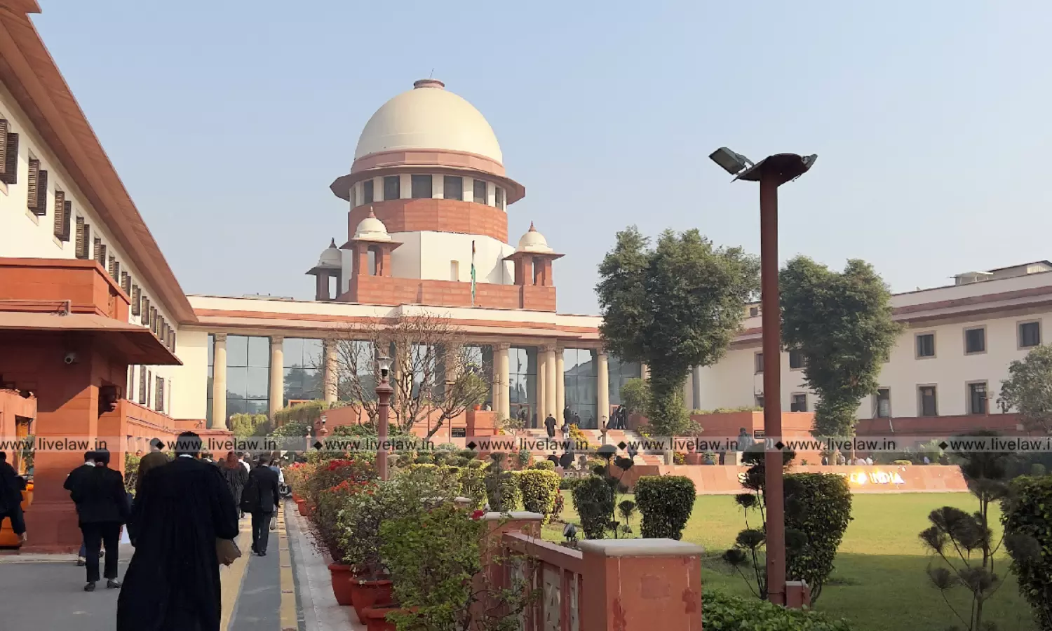 Supreme Court of India building with a gavel and scales