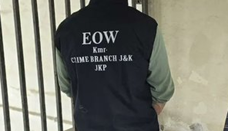 Crime Branch officials conducting searches in Srinagar and Budgam