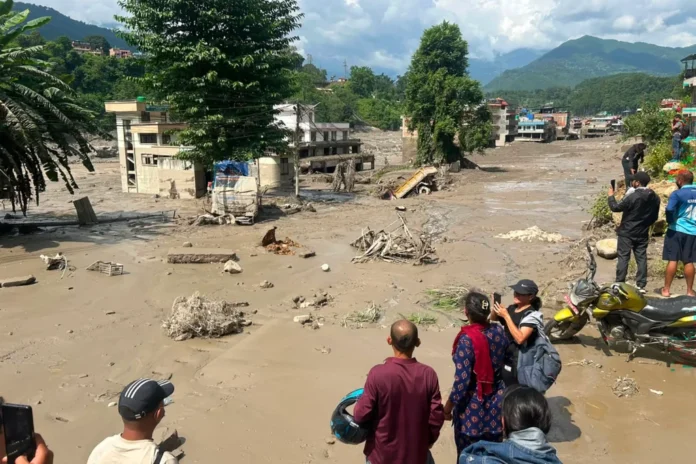 Nepal flash floods aftermath showing damage and rescue efforts